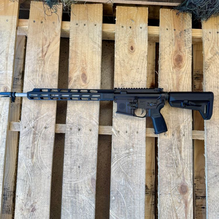 SIG Sauer M400 TREAD V2 AR-15 rifle chambered in 5.56 NATO with 16 inch barrel and M-LOK handguard, in store image