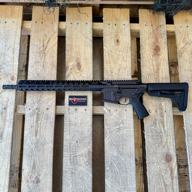 Sig Sauer M400 SDI XSeries AR-15 rifle chambered in 5.56 NATO with 16 inch barrel, M-LOK handguard and Magpul SL stock, in store image