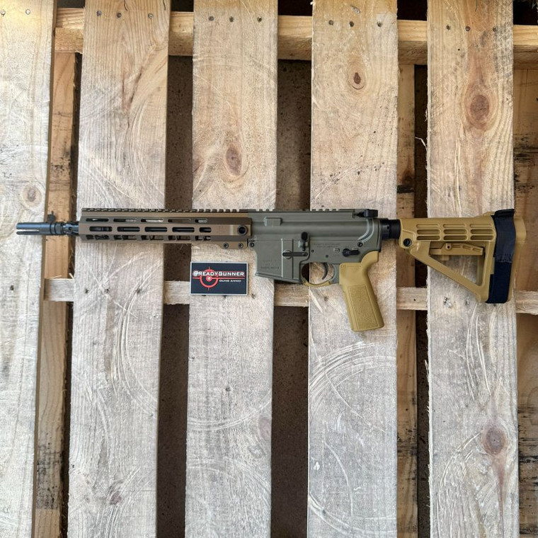 PSA Sabre-15 11.5-inch 5.56 AR pistol with Moss Green Cerakote finish, RifleSpeed adjustable gas block, burnt bronze handguard, and SBA4 brace, in store image