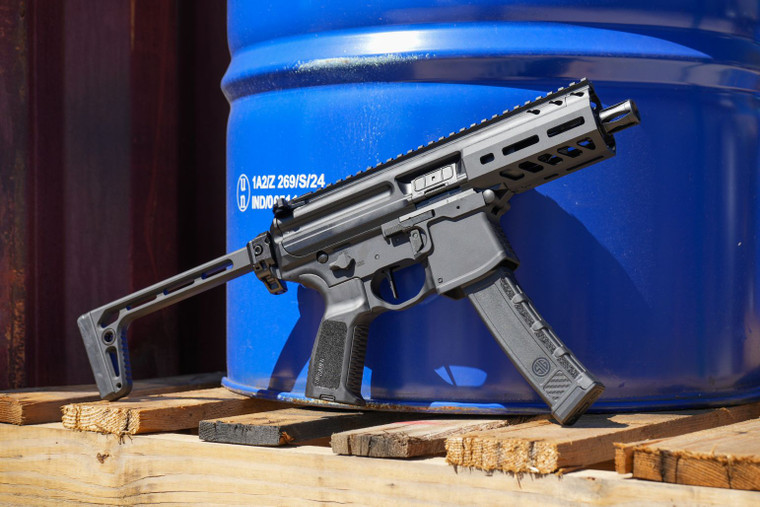 Sig Sauer MPX 9mm short-barreled rifle with 4.5 inch barrel folding stock and black M-LOK handguard, pointed to the right