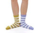 12538780-funny-legs-in-socks-of-different-colors-on-white-background.jpg