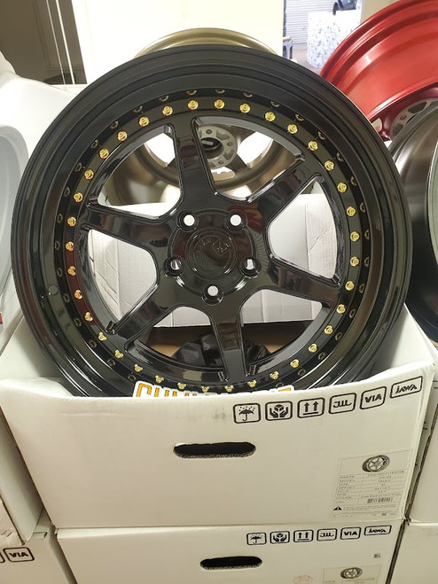 AodHan DS09 18x9.5 5x114.3 +30 73.1 Gloss Black W /Gold Rivets (DPFTM)
