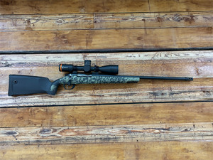 Gunwerks Magnus WRX 7 PRC Rifle with 22-inch Graphite finish stainless steel barrel, Revic Acura RS25i scope, and Green Fracture stock, featuring Berger bullet ammo and ballistic turret for long-range hunting and precision shooting. Gunwerks Magnus WRX 7 PRC Rifle with 22-inch Graphite finish stainless steel barrel, Revic Acura RS25i scope, and Green Fracture stock, featuring Berger bullet ammo and ballistic turret for long-range hunting and precision shooting.