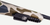 Weatherby 307 HUSH Edition 7mm PRC Bolt Action Rifle featuring a hydrodipped Tundra Camo stock, fluted barrel with Graphite Black Cerakote finish, Peak 44 Pic Rail, adjustable TriggerTech Field Trigger, and Magpul removable magazine, designed for precision and rugged hunting conditions. Weatherby 307 HUSH Edition 7mm PRC Bolt Action Rifle featuring a hydrodipped Tundra Camo stock, fluted barrel with Graphite Black Cerakote finish, Peak 44 Pic Rail, adjustable TriggerTech Field Trigger, and Magpul removable magazine, designed for precision and rugged hunting conditions.