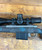 Gunwerks Magnus .300 Win Mag Rifle System with 24-inch barrel, Kahles K525i SKMR4 5-25x56mm first focal plane scope, and Carbon Blue carbon fiber stock, featuring a stainless steel GLR SS action, directional muzzle brake, and GW floorplate, designed for long-range hunting, precision shooting, and tactical applications. Gunwerks Magnus .300 Win Mag Rifle System with 24-inch barrel, Kahles K525i SKMR4 5-25x56mm first focal plane scope, and Carbon Blue carbon fiber stock, featuring a stainless steel GLR SS action, directional muzzle brake, and GW floorplate, designed for long-range hunting, precision shooting, and tactical applications.