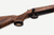 Weatherby 307 Adventure SD 22 Creedmoor Bolt Action Rifle with 22 Inch Graphite Black Fluted Threaded Barrel and 2 Inch Brake in Walnut and Rosewood Stock