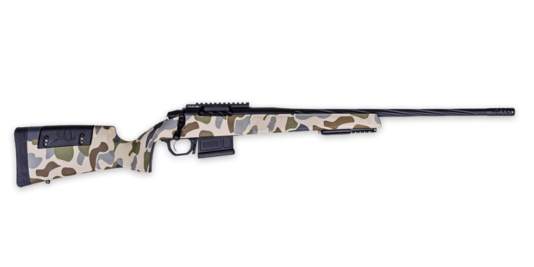 Weatherby 307 HUSH Edition 7mm PRC Bolt Action Rifle featuring a hydrodipped Tundra Camo stock, fluted barrel with Graphite Black Cerakote finish, Peak 44 Pic Rail, adjustable TriggerTech Field Trigger, and Magpul removable magazine, designed for precision and rugged hunting conditions. Weatherby 307 HUSH Edition 7mm PRC Bolt Action Rifle featuring a hydrodipped Tundra Camo stock, fluted barrel with Graphite Black Cerakote finish, Peak 44 Pic Rail, adjustable TriggerTech Field Trigger, and Magpul removable magazine, designed for precision and rugged hunting conditions.