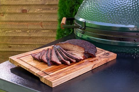 Briskett Sliced Beside the Big Green Egg Grill