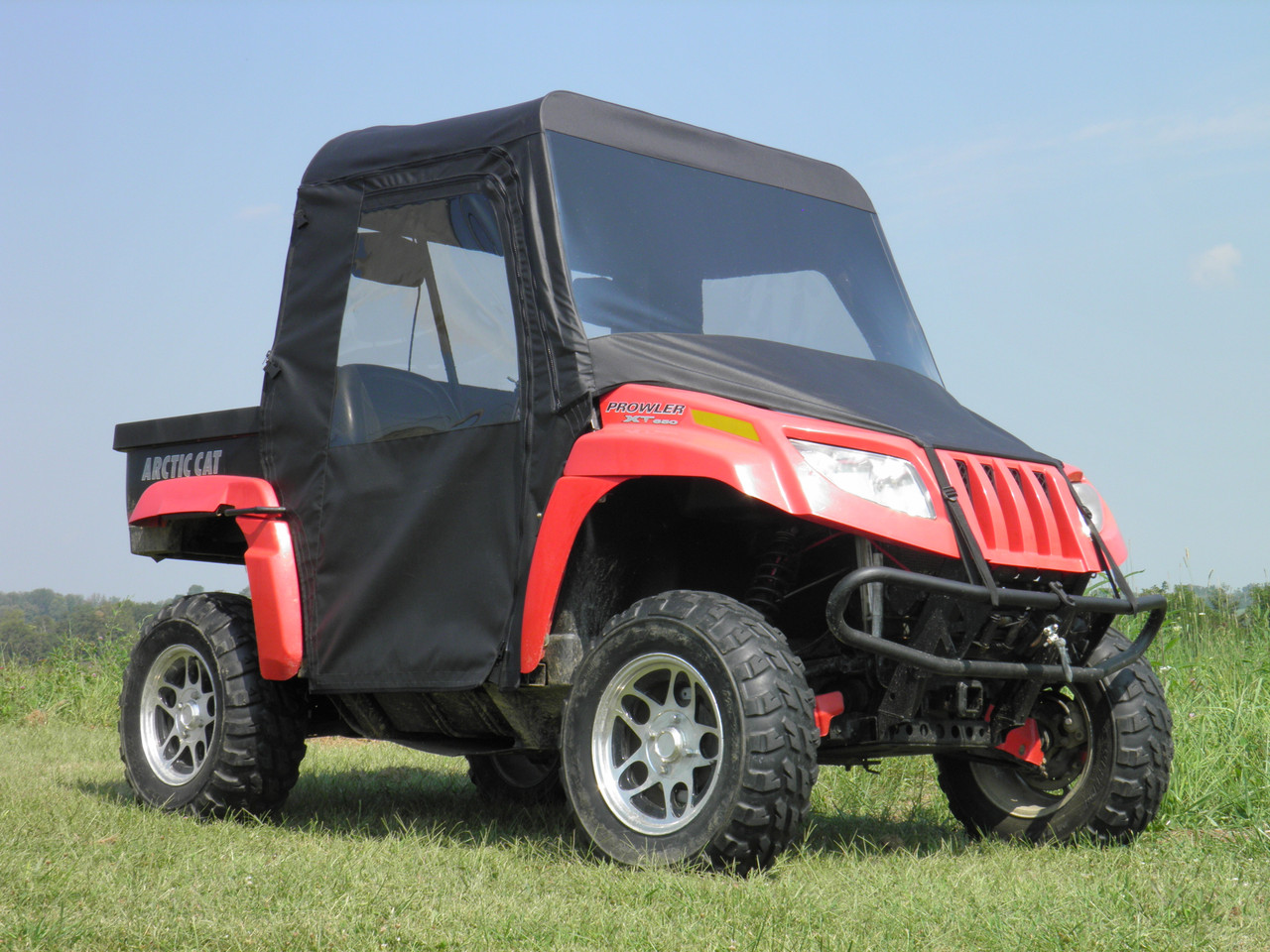 Full cab enclosure with vinyl windshield front and side views