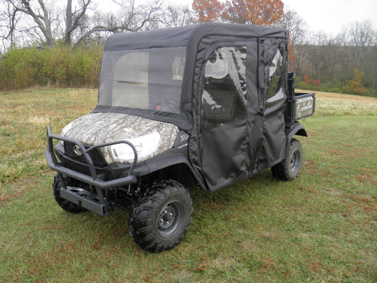 3 Star side x side Kubota RTV X1140 full cab enclosure with vinyl windshield front and side angle view