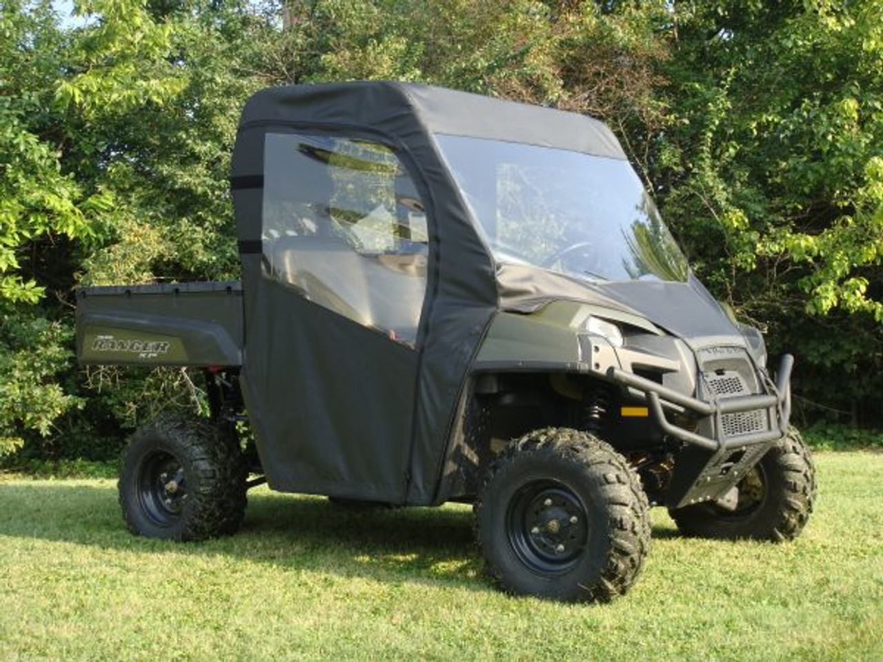 3 Star side x side Polaris Ranger full-size 500/700 full cab enclosure with vinyl windshield front and side angle view