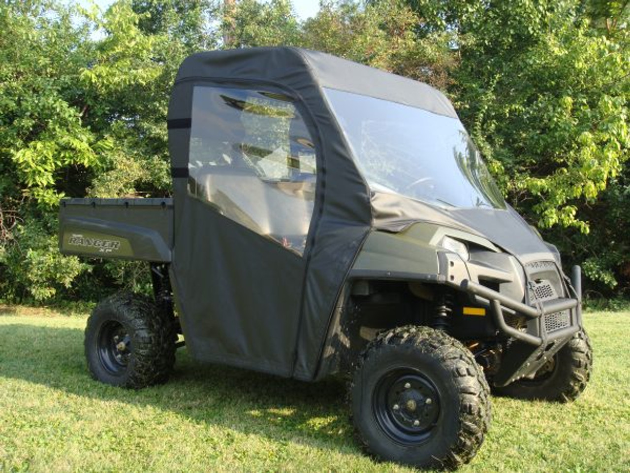 3 Star side x side Polaris Ranger full-size 500/700 full cab enclosure with vinyl windshield front and side angle view