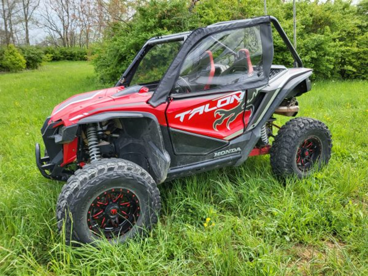 3 Star side x side Honda Talon 1000-2 doors side and front angle view