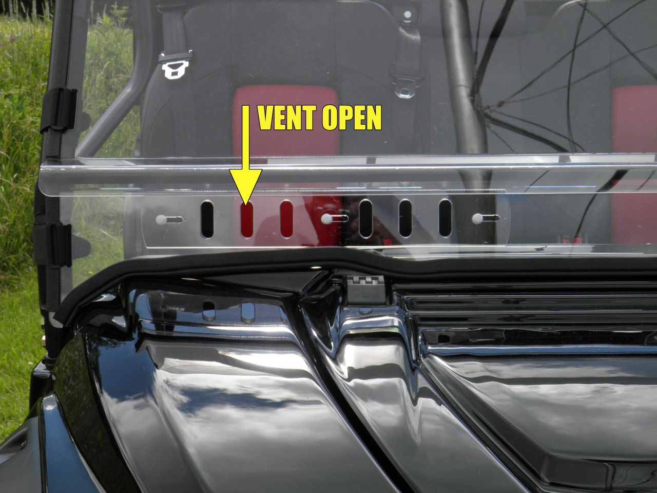 Polaris General one piece windshield with optional vents and scratch-resistant coating vents open