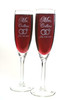 Your set includes 2 Double Wedding Ring Champagne Flutes on Petal Stems by Design Imagery Engraving