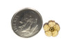 Plumeria earrings compared to a dime for size perspective