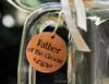 Closeup of Handcrafted Father of the Groom Charm by Design Imagery Engraving