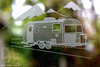 Closeup of Camper on the Road by Design Imagery Engraving