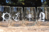 Nautical Stemless Wine Glass Set with Sailboat, Compass Rose, Ships Wheel, and Anchor offered in 16oz or 21oz  fine rimmed stemless wine glasses featuring artwork by Design Imagery Engraving