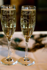 Photo of Design Imagery Engraving Flutes at a Wedding