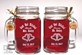 Just got Hitched Mason Jar Set with Handcrafted Wooden Charms featuring double hearts, all engraved in the same high resolution we use on our fine crystal engravings.