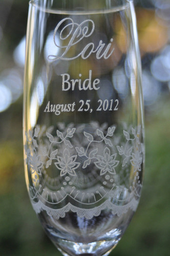Lace Art Engraved all around this tall fine rimmed champagne flute