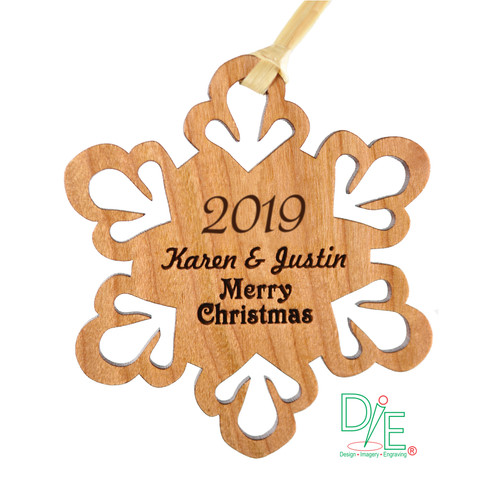 Wooden Snowflake Ornament made from Solid Cherrywood.  Hand sanded and finished with clear coat.