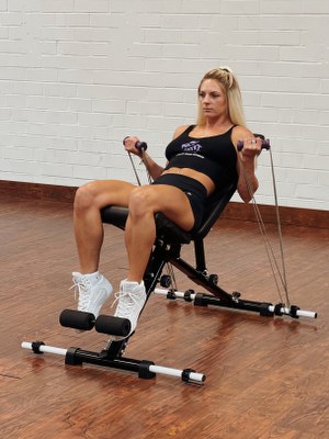 woman doing arms exercise with intense resistance band holding intense resistance bands handle grips on intense band adjustable exercise bench