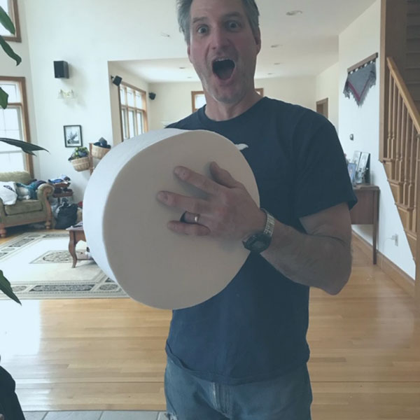 Happy Man with Charmin Forever Roll