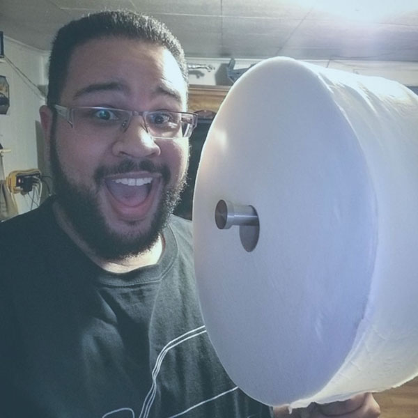 Suprized Man with Charmin Forever Roll