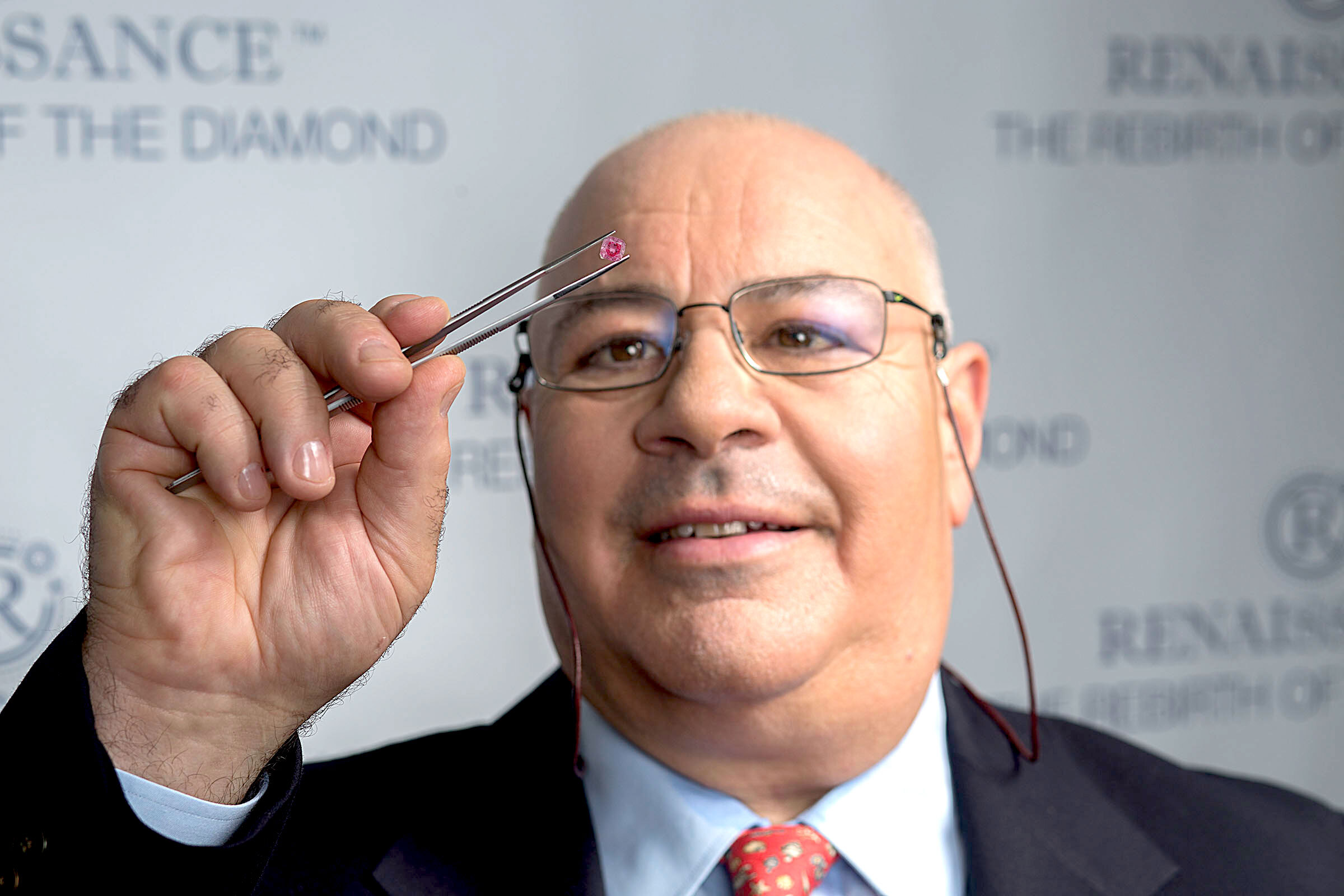 NK Inspecting Pink Diamond