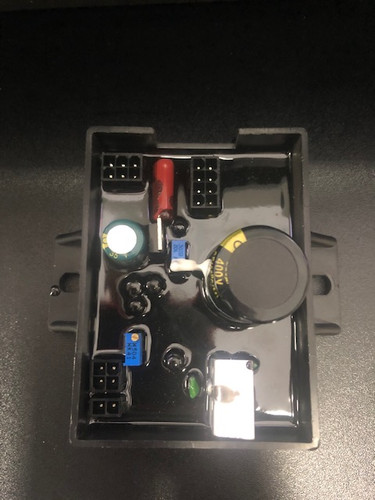 Automatic Voltage Regulator<br>For Models After 0520<br>W/ Automatic idle speed adjustment<br>Square black small box goes behind control panel.