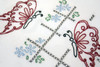 Aunt Martha’s #3437 Butterflies and Cross Stitch iron-on embroidery transfer pattern featuring seven vintage butterfly designs with decorative borders for days-of-the-week tea towels.