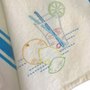 Aunt Martha's #3632 Fruit & Vegetable Motifs embroidered on Aunt Martha's Turquoise Bold Stripe Towel