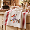 Vintage Days of the Week Gremlin hand embroidery designs stitched on white flour sack kitchen towels using Aunt Martha's® #3166 iron-on embroidery transfers.