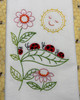 Stitcher's Revolution® Hand Stitch Iron-on Embroidery Transfer Pattern #SR45 Retro Red Truck stitched onto Aunt Martha's® flour sack dishtowel.