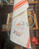 Vogart® Hand Stitch Iron-on Embroidery Transfer Pattern #672 Dutch Treat stitched onto Aunt Martha's® retro bold striped kitchen towels.