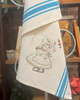 Vogart® Hand Stitch Iron-on Embroidery Transfer Pattern #672 Dutch Treat stitched onto Aunt Martha's® retro bold striped kitchen towels.