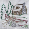 Stitcher’s Revolution® Northwoods Lodge iron-on embroidery transfer pattern featuring cabin, wildlife, and camping scenes (SKU SR46)