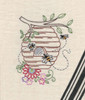 Stitcher’s Revolution SR49 Buzzing Bees iron-on embroidery transfer pattern featuring bees, hives, honey pots, flowers, and save the bees design.