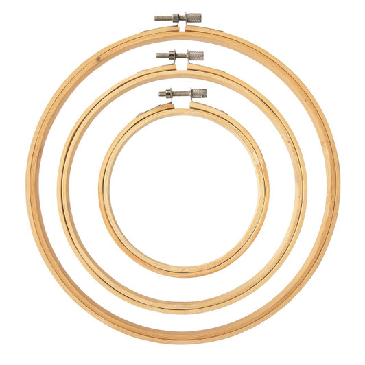 Set of 3 DMC round bamboo embroidery hoops in 4", 7", and 12" sizes. Set of 3 DMC round bamboo embroidery hoops in 4", 7", and 12" sizes.