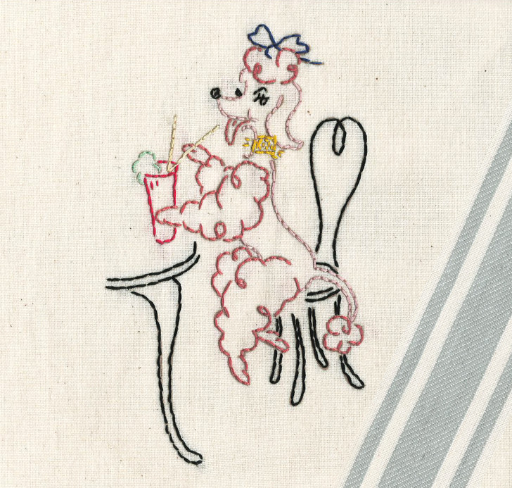 Aunt Martha's Embroidery Transfer Pattern #3536 Gay Fifi the French Poodle. Embroidered on Retro Bold Twill Gray Stripe Towel, found here: https://colonialpatterns.com/shop/product/retro-bold-twill-gray-stripe-towels/