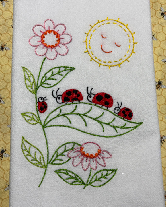 Stitcher's Revolution® Hand Stitch Iron-on Embroidery Transfer Pattern #SR45 Retro Red Truck stitched onto Aunt Martha's® flour sack dishtowel.