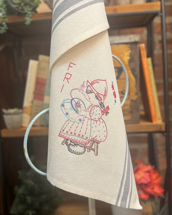 Vogart® Hand Stitch Iron-on Embroidery Transfer Pattern #672 Dutch Treat stitched onto Aunt Martha's® retro bold striped kitchen towels.