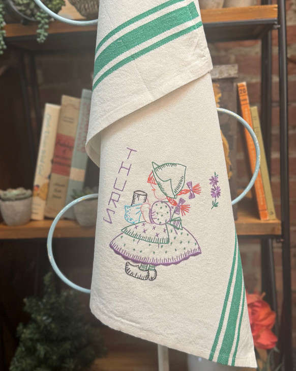 Vogart® Hand Stitch Iron-on Embroidery Transfer Pattern #672 Dutch Treat stitched onto Aunt Martha's® retro bold striped kitchen towels.