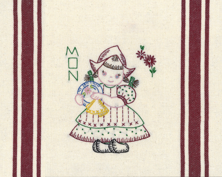 Vogart® Hand Stitch Iron-on Embroidery Transfer Pattern #672 Dutch Treat stitched onto Aunt Martha's® retro bold striped kitchen towels.
