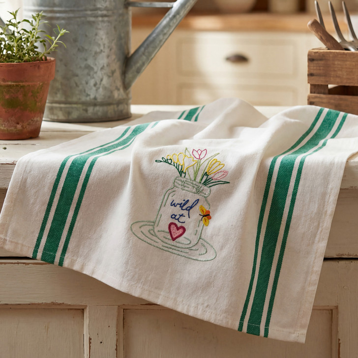 Aunt Martha's® #4044 Wildflowers Iron-on Hand Stitch Embroidery Transfer Pattern - Wild At Heart stitched onto Aunt Martha's® Vintage Retro Stripe Dishtowels.
