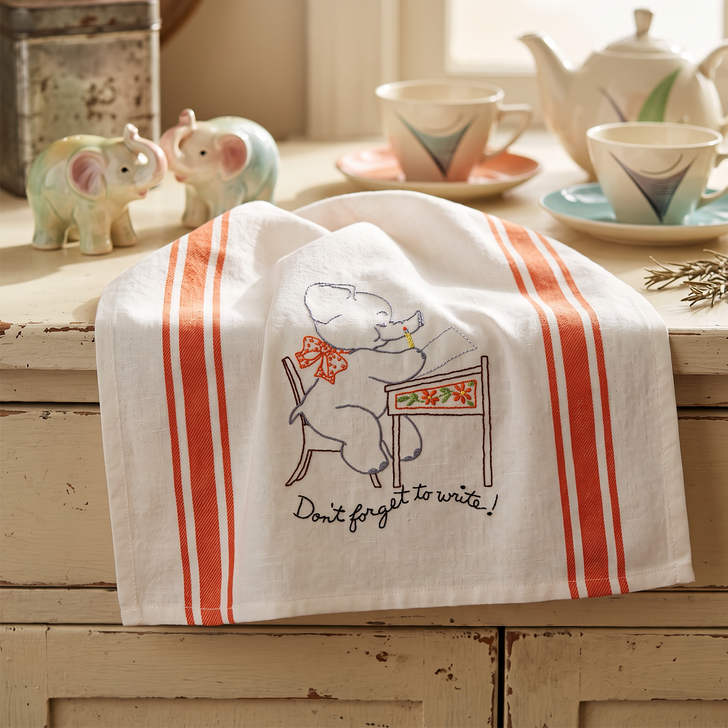 Aunt Martha’s #3797 Funny Elephants vintage iron-on embroidery transfer pattern with seven humorous elephant designs.
