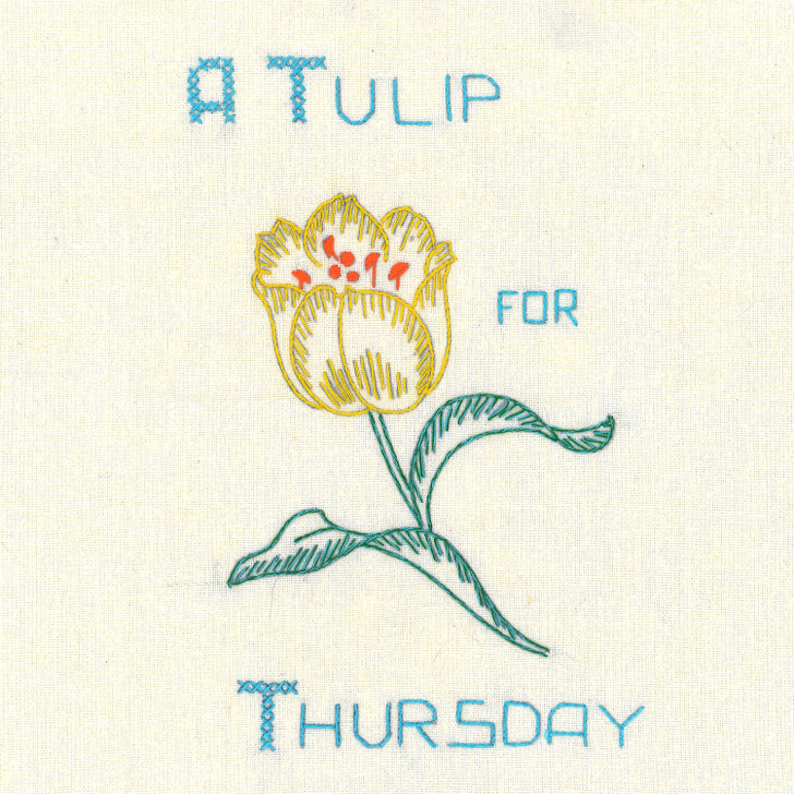Vogart #215 A Flower A Day for Your Kitchen vintage iron-on Days of the Week embroidery transfer pattern featuring seven floral designs and smaller motifs for potholders and guest towels.
