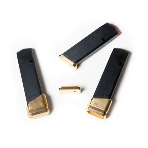Assortment of JagerWerks brass magazine accessories